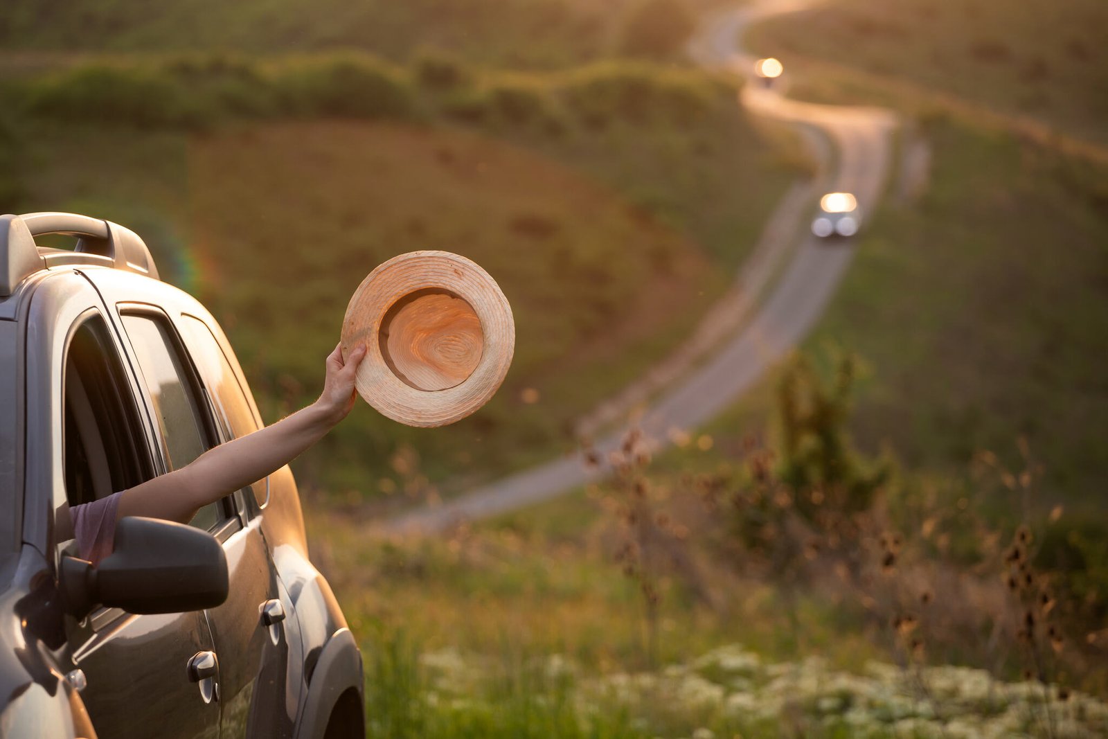 girl-with-hat-in-the-window-of-the-car-adventure-2024-06-11-17-20-32-utc_Easy-Resize.com_.jpg